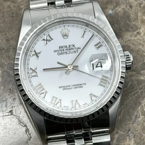 Rolex Datejust 36 with White Roman Dial Engine Turned Bezel Jubilee Bracelet Model 16220
